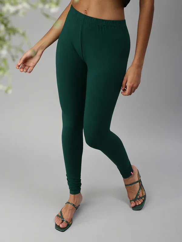 Alluring Stretchable Cotton Fabric Bottle Green Leggings For Women